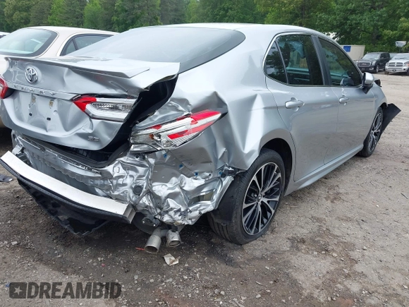 2018 Toyota Camry LE z VIN 4T1B11HK3JU129549, wystawiony jako IAAI lot #42159243 z przebiegiem 76 299 mil mil oraz . Historia ofert i sprzedaży dostępna na DreamBid. Obrazek 4.