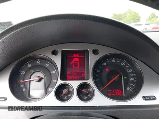 2009 Volkswagen Passat z VIN WVWXK73C69E027467, wystawiony jako IAAI lot #42277275 z przebiegiem 145 956 mil mil oraz . Historia ofert i sprzedaży dostępna na DreamBid. Obrazek 7.