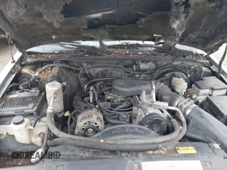 2000 Chevrolet Blazer LT z VIN 1GNDT13WXY2214421, wystawiony jako IAAI lot #41525220 z przebiegiem Nie podano mil oraz . Historia ofert i sprzedaży dostępna na DreamBid. Obrazek 10.