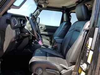 2021 Jeep Wrangler Unlimited Sahara with VIN 1C4JJXP69MW800920, listed as a Copart auction lot 52033745 with 49,173 mi miles and Salvage Title. Bid and sale history available at DreamBid. Image 7.