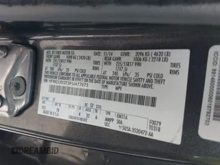 2015 Ford Escape SE with VIN 1FMCU0G73FUA77673, listed as a IAAI auction lot 41988290 with 176,734 mi miles. Bid and sale history available at carsss.com. Image 9.