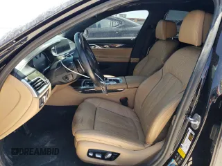 2018 BMW 7 Series M760i xDrive with VIN WBA7H6C51JG614580, listed as a Copart auction lot 65748304 with 46,801 mi miles and Clean Title. Bid and sale history available at carsss.com. Image 7.