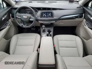 2023 Cadillac XT4 FWD Luxury with VIN 1GYAZAR46PF104791, listed as a Copart auction lot 51351115 with 17,930 mi miles and Salvage Title. Bid and sale history available at DreamBid. Image 8.