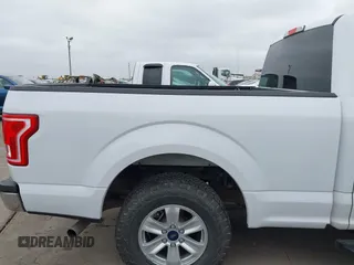 2017 Ford F-150 XL with VIN 1FTEX1CG5HKC87769, listed as a IAAI auction lot 41711952 with 147,486 mi miles. Bid and sale history available at carsss.com. Image 20.