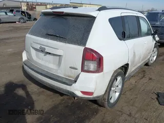 2016 Jeep Compass High Altitude Edition with VIN 1C4NJDEB8GD757798, listed as a IAAI auction lot 41468371 with 114,744 mi miles. Bid and sale history available at carsss.com. Image 4.