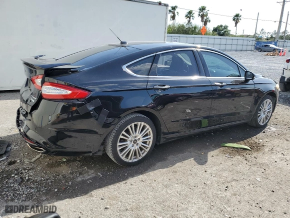 2016 Ford Fusion Titanium with VIN 3FA6P0K96GR261229, listed as a Copart auction lot 52696115 with 87,954 mi miles and Salvage Title. Bid and sale history available at carsss.com. Image 3.