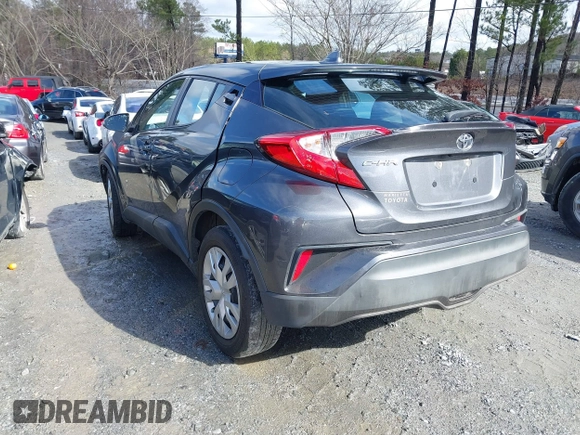 2021 Toyota C-HR LE with VIN NMTKHMBX9MR128998, listed as a IAAI auction lot 41575235 with 96,908 mi miles. Bid and sale history available at carsss.com. Image 3.