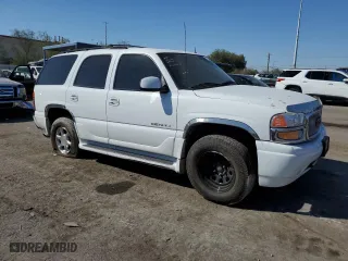 2002 GMC Yukon Denali with VIN 1GKEK63UX2J183619, listed as a Copart auction lot 74744354 with 155,188 mi miles and Salvage Title. Bid and sale history available at carsss.com. Image 4.