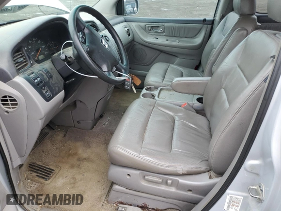 2003 Honda Odyssey EX-L z VIN 5FNRL18983B043014, wystawiony jako Copart lot #52568405 z przebiegiem 194 266 mil mil oraz Czysty tytuł • Clean title. Historia ofert i sprzedaży dostępna na DreamBid. Obrazek 7.