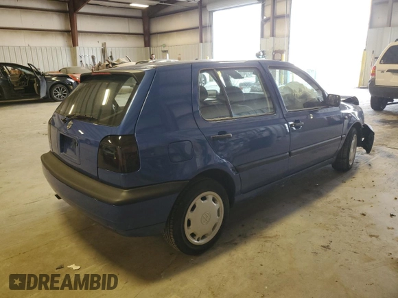 1996 Volkswagen Golf z VIN 3VWFA81H1TM066758, wystawiony jako Copart lot #41832035 z przebiegiem Nie podano mil oraz Szkoda całkowita • Salvage title. Historia ofert i sprzedaży dostępna na DreamBid. Obrazek 3.