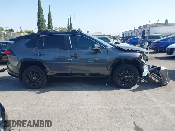 2023 Toyota RAV4 Hybrid XSE with VIN 4T3E6RFV6PU120175, listed as a IAAI auction lot 42499631 with 27,452 mi miles and . Bid and sale history available at DreamBid. Image 14.