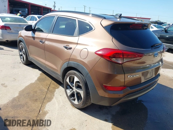2016 Hyundai Tucson Limited with VIN KM8J33A25GU074798, listed as a IAAI auction lot 42103566 with 143,777 mi miles and . Bid and sale history available at carsss.com. Image 3.