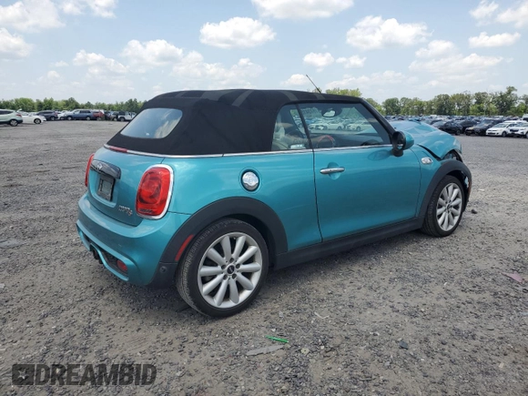 2018 MINI Convertible Cooper S with VIN WMWWG9C59J3D22587, listed as a Copart auction lot 61673415 with 34,935 mi miles and Salvage title. Bid and sale history available at DreamBid. Image 3.