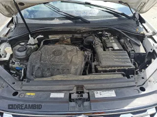 2018 Volkswagen Tiguan S z VIN 3VV1B7AX1JM083571, wystawiony jako Copart lot #54136505 z przebiegiem 137 173 mil mil oraz Szkoda całkowita • Salvage title. Historia ofert i sprzedaży dostępna na DreamBid. Obrazek 12.