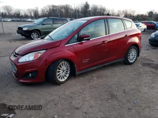 2016 Ford C-Max Energi SEL with VIN 1FADP5CU8GL119986, listed as a Copart auction lot 82677273 with 64,021 mi miles. Bid and sale history available at carsss.com. Image 1.