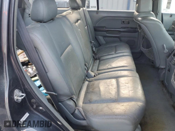 2005 Honda Pilot EX-L z VIN 2HKYF18705H564606, wystawiony jako Copart lot #55747785 z przebiegiem 272 432 mil mil oraz Szkoda całkowita • Salvage title. Historia ofert i sprzedaży dostępna na DreamBid. Obrazek 10.