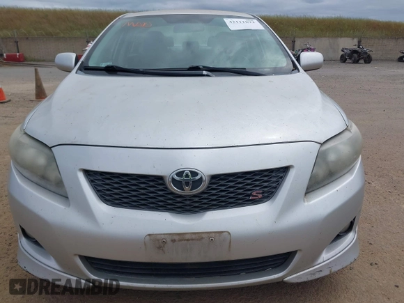 2009 Toyota Corolla with VIN 1NXBU40EX9Z028809, listed as a IAAI auction lot 42111892 with 156,182 mi miles. Bid and sale history available at carsss.com. Image 6.
