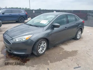 2018 Ford Focus SE z VIN 1FADP3F23JL321768, wystawiony jako IAAI lot #42415788 z przebiegiem 124 126 mil mil oraz . Historia ofert i sprzedaży dostępna na DreamBid. Obrazek 17.