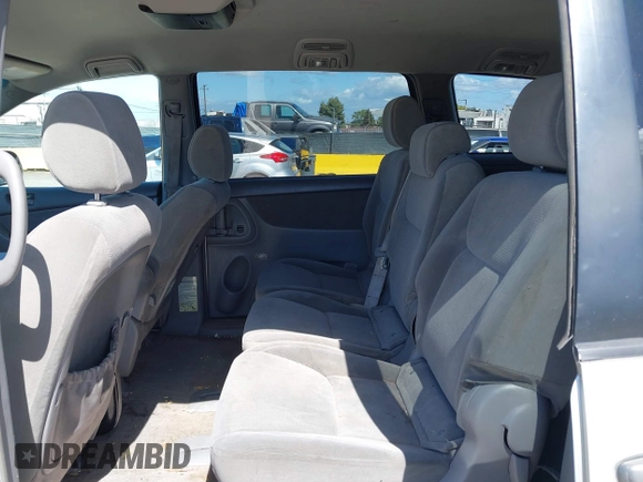 2005 Toyota Sienna CE with VIN 5TDZA23C55S303379, listed as a IAAI auction lot 42238935 with 262,259 mi miles and . Bid and sale history available at DreamBid. Image 8.