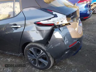 2021 Nissan LEAF SV with VIN 1N4AZ1CVXMC553479, listed as a IAAI auction lot 41452391 with 42,820 mi miles and . Bid and sale history available at DreamBid. Image 6.