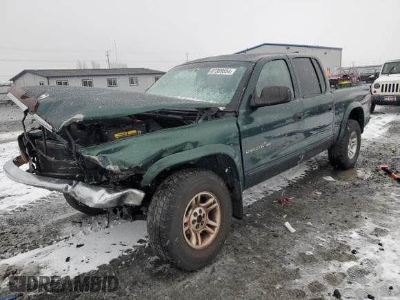2002 Dodge Dakota SLT с VIN 1B7HG48N12S614309, выставлен на аукционе Copart как лот 87309554 с пробегом 287 994 миль миль и Списание • Salvage title. История ставок и продаж доступна на DreamBid. Изображение 1.