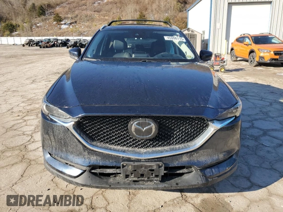 2018 Mazda CX-5 Grand Touring with VIN JM3KFBDM8J0399975, listed as a Copart auction lot 45998115 with 98,037 mi miles and Salvage Title. Bid and sale history available at DreamBid. Image 5.