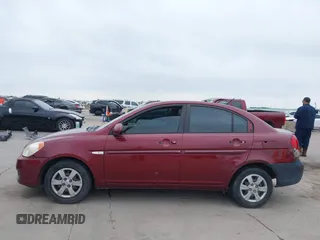 2007 Hyundai Accent GLS with VIN KMHCN46C57U108605, listed as a IAAI auction lot 41932061 with 195,580 mi miles. Bid and sale history available at carsss.com. Image 15.