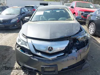 2009 Acura TL Tech with VIN 19UUA86569A019919, listed as a IAAI auction lot 41908425 with 109,726 mi miles. Bid and sale history available at carsss.com. Image 12.