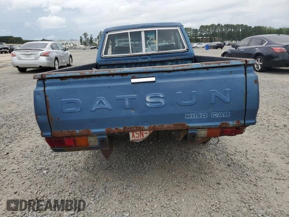1981 Datsun 720 z VIN JN6MD06S9BW022929, wystawiony jako Copart lot #73064384 z przebiegiem 389 743 mil mil oraz Szkody całkowita. Historia ofert i sprzedaży dostępna na DreamBid. Obrazek 6.