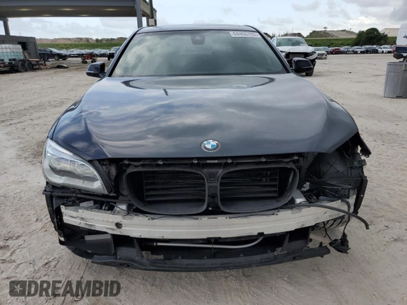 2013 BMW 7 Series 750i with VIN WBAYA8C56DC996704, listed as a Copart auction lot 64466705 with 102,278 mi miles and Salvage title. Bid and sale history available at DreamBid. Image 5.