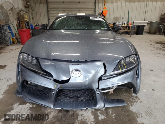 2021 Toyota Supra 3.0 z VIN WZ1DB0C06MW043625, wystawiony jako Copart lot #48971283 z przebiegiem 8255 mil mil oraz . Historia ofert i sprzedaży dostępna na DreamBid. Obrazek 5.