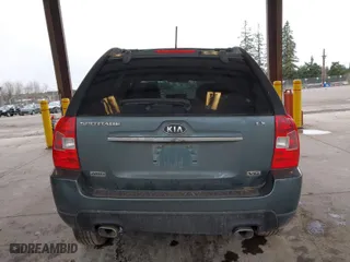 2009 Kia Sportage LX with VIN KNDJE723X97573885, listed as a IAAI auction lot 41788620 with 136,650 mi miles. Bid and sale history available at carsss.com. Image 16.