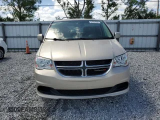 2014 Dodge Grand Caravan SXT z VIN 2C4RDGCG8ER266814, wystawiony jako Copart lot #52053155 z przebiegiem 279 551 mil mil oraz Tytuł czysty. Historia ofert i sprzedaży dostępna na DreamBid. Obrazek 5.