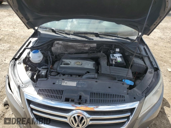 2011 Volkswagen Tiguan S z VIN WVGAV7AX9BW511129, wystawiony jako Copart lot #51907435 z przebiegiem 134 383 mil mil oraz Czysty tytuł • Clean title. Historia ofert i sprzedaży dostępna na DreamBid. Obrazek 12.