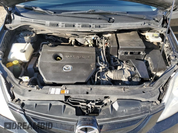 2010 Mazda 5 Sport z VIN JM1CR2W36A0368376, wystawiony jako Copart lot #53729095 z przebiegiem 290 372 mil mil oraz Szkoda całkowita • Salvage title. Historia ofert i sprzedaży dostępna na DreamBid. Obrazek 12.