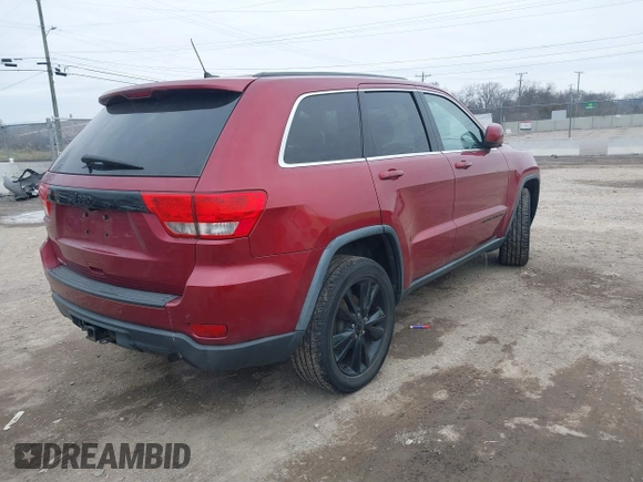 2013 Jeep Grand Cherokee Laredo with VIN 1C4RJEAG4DC573971, listed as a IAAI auction lot 41627288 with 143,256 mi miles. Bid and sale history available at carsss.com. Image 4.