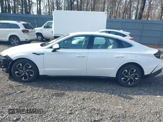 2024 Hyundai Sonata SEL z VIN KMHL64JA4RA395863, wystawiony jako IAAI lot #41801732 z przebiegiem 3 034 mil mil oraz . Historia ofert i sprzedaży dostępna na DreamBid. Obrazek 14.