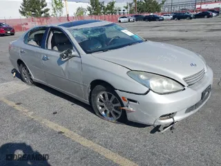2004 Lexus ES 330 with VIN JTHBA30G240010487, listed as a IAAI auction lot 41627116 with 148,748 mi miles. Bid and sale history available at carsss.com. Image 1.