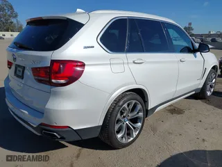 2018 BMW X5 xDrive40e iPerformance with VIN 5UXKT0C53J0W00910, listed as a IAAI auction lot 41842046 with 48,838 mi miles. Bid and sale history available at carsss.com. Image 4.