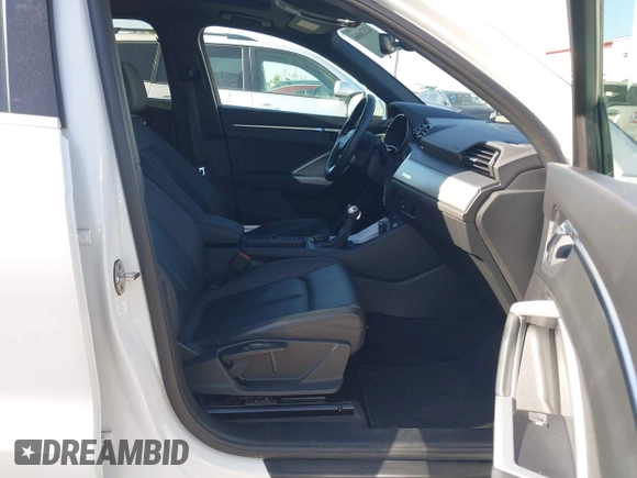 2019 Audi Q3 Premium z VIN WA1AECF32K1072625, wystawiony jako IAAI lot #42326866 z przebiegiem 67 351 mil mil oraz . Historia ofert i sprzedaży dostępna na DreamBid. Obrazek 5.