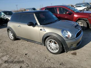 2009 MINI Hardtop S with VIN WMWMF73529TW82713, listed as a Copart auction lot 51152035 with 170,954 mi miles and Salvage title. Bid and sale history available at DreamBid. Image 4.