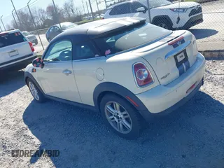 2012 MINI Coupe z VIN WMWSX1C50CT163832, wystawiony jako IAAI lot #41837456 z przebiegiem 123 906 mil mil oraz . Historia ofert i sprzedaży dostępna na DreamBid. Obrazek 3.