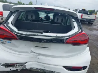 2021 Chevrolet Bolt EV LT z VIN 1G1FY6S05M4101349, wystawiony jako IAAI lot #42362226 z przebiegiem 47 005 mil mil oraz . Historia ofert i sprzedaży dostępna na DreamBid. Obrazek 16.