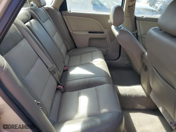 2006 Mercury Montego Premier with VIN 1MEHM421X6G617781, listed as a Copart auction lot 74932874 with 111,105 mi miles and Salvage Title. Bid and sale history available at carsss.com. Image 10.