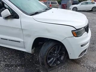 2018 Jeep Grand Cherokee High Altitude z VIN 1C4RJECG0JC223424, wystawiony jako IAAI lot #42116920 z przebiegiem 122 884 mil mil oraz . Historia ofert i sprzedaży dostępna na DreamBid. Obrazek 6.