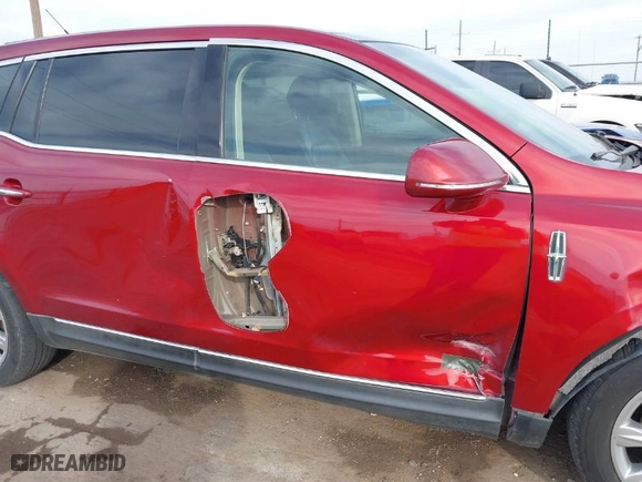 2013 Lincoln MKT EcoBoost with VIN 2LMHJ5AT8DBL50535, listed as a IAAI auction lot 41585415 with 173,543 mi miles. Bid and sale history available at carsss.com. Image 6.