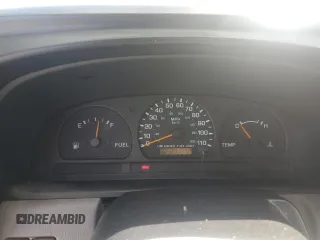 1999 Nissan Frontier XE z VIN 1N6ED26Y2XC301913, wystawiony jako Copart lot #53152165 z przebiegiem 271 272 mil mil oraz Szkoda całkowita • Salvage title. Historia ofert i sprzedaży dostępna na DreamBid. Obrazek 9.