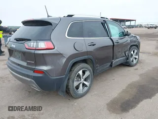 2020 Jeep Cherokee Limited with VIN 1C4PJMDX4LD589884, listed as a IAAI auction lot 41917930 with 57,703 mi miles and . Bid and sale history available at DreamBid. Image 4.