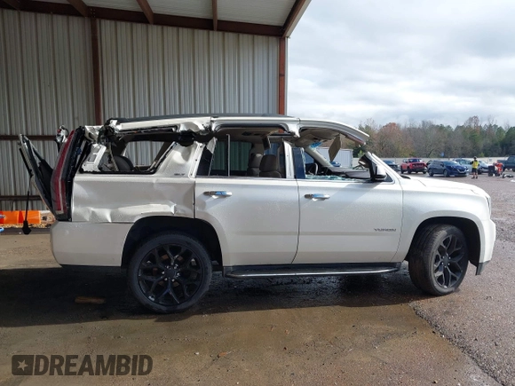 2015 GMC Yukon SLT with VIN 1GKS2BKC6FR612606, listed as a IAAI auction lot 41096580 with Not Provided miles and . Bid and sale history available at DreamBid. Image 14.