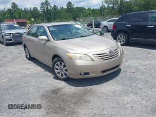 2007 Toyota Camry LE z VIN 4T1BK46KX7U512527, wystawiony jako IAAI lot #42445854 z przebiegiem 127 872 mil mil oraz . Historia ofert i sprzedaży dostępna na DreamBid. Obrazek 1.
